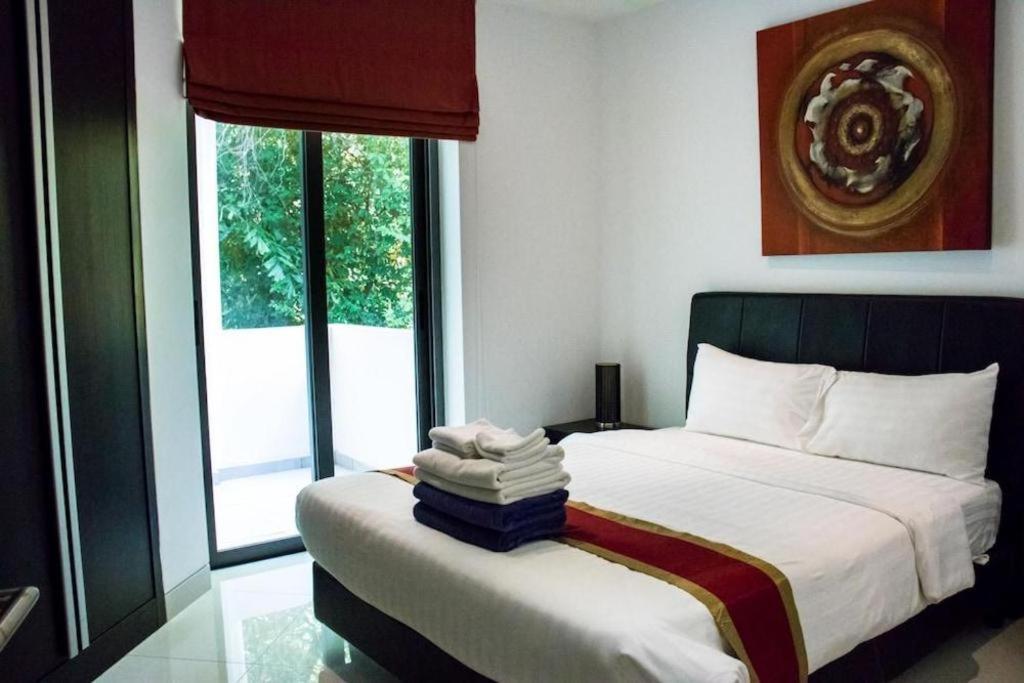 Sansuri Resort Praia de Surin Exterior foto